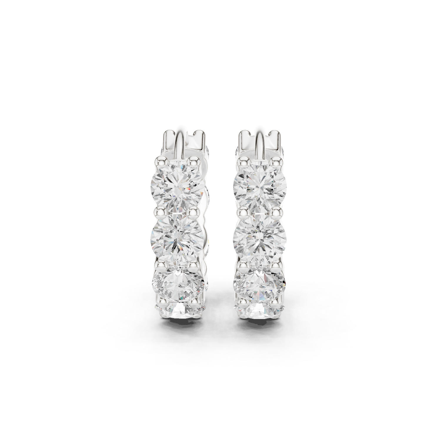 Pair of diamond hoop earrings on a white background